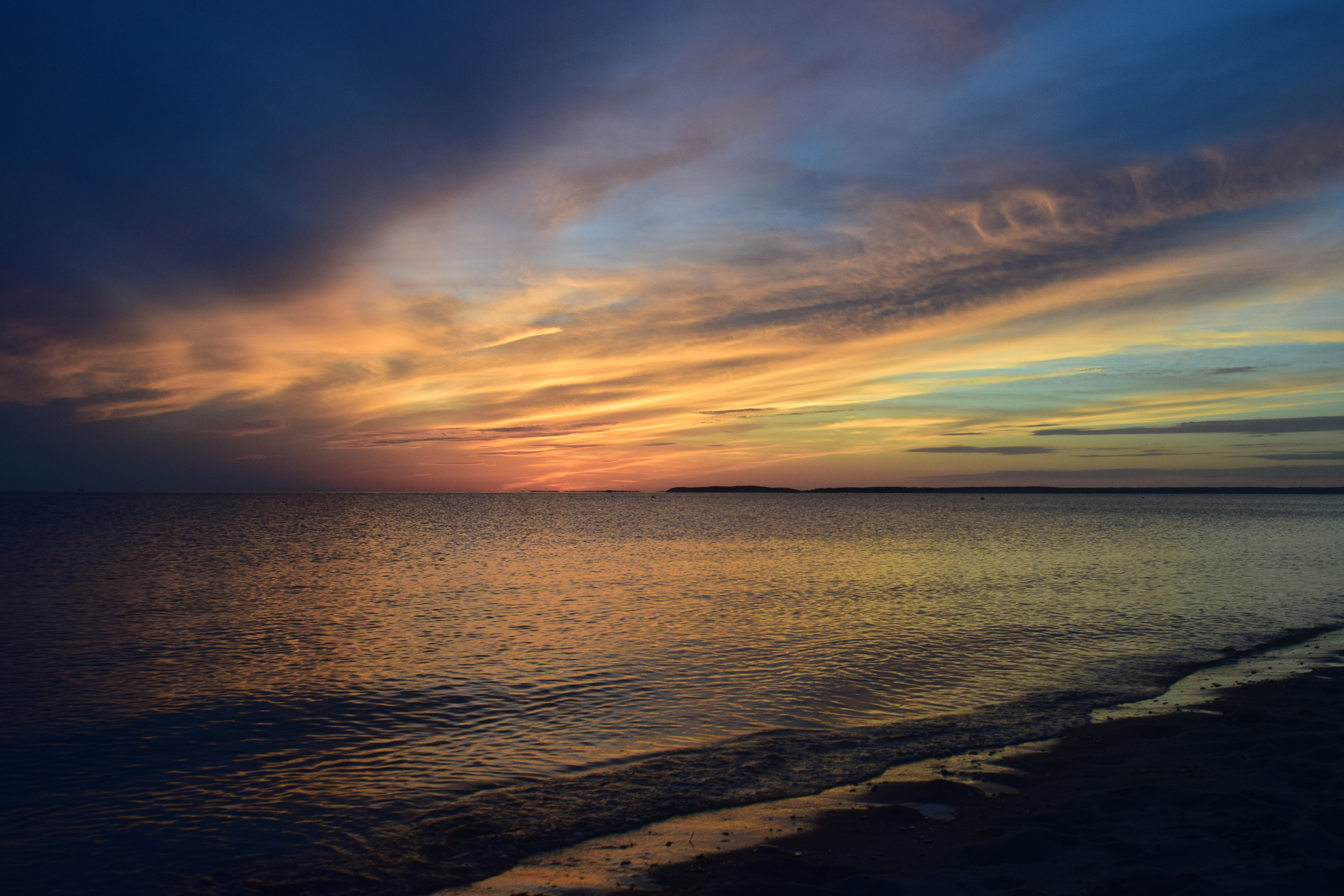 Colorful light across clouds and sky